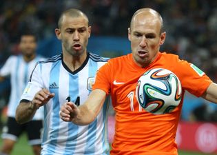 Pic: Nice guy Arjen Robben gives his jersey to a disabled supporter after Holland’s win against Latvia