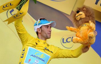 ICYMI: Squirm as Tour de France stage winner Vincenzo Nibali tries and fails to get on-stage kiss
