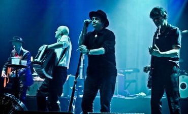 Man suffers heart attack during Pogues gig but is saved by mystery stranger in the crowd