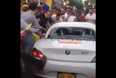 Video: Watch as rowdy Colombian football fans smash up a BMW Z4 in New York