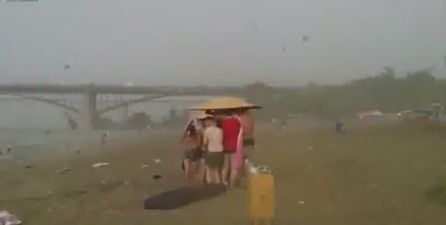 Video: Siberian sunbathers flee from golf balls sized hailstones