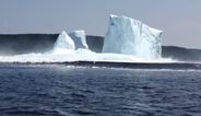 Video: Iceberg collapses causing huge tidal wave to rush towards terrified onlookers