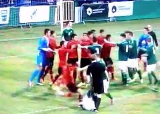 Vine: Northern Ireland player target of vicious kick to the head as violence breaks out in Milk Cup clash with Mexico