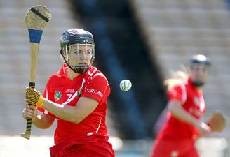 Video: Cork camogie star Anna Geary shows off her freestyle hurling skills in high heels