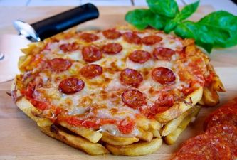 We’re putting on the pounds just looking at this magnificent pizza with a base made from chips