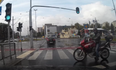 Video: Good guy biker escorts elderly man across busy road