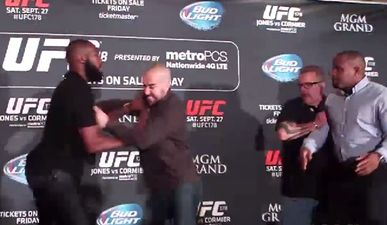 Video: Conor McGregor laughs as Jon Jones and Daniel Cormier fight at UFC 178 media day