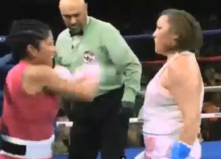 Video: Female boxer gets fitting punishment after deliberately dropping her guard at the end of a fight