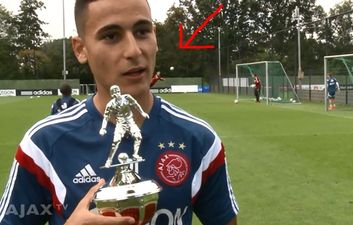 Video: Ajax player receiving goal of the month award upstaged by ‘keeper scoring amazing diving header in the background