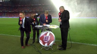 Vine: The ITV panel got absolutely soaked by the on-pitch sprinklers before the England game