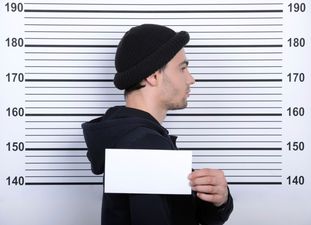 Pic: Bank robber in Denver has perhaps the happiest-looking police mugshot ever seen