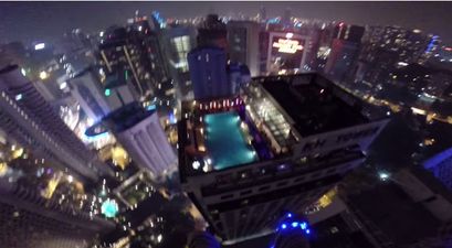 Video: Incredible GoPro footage captures a base jump into a Kuala Lumpur hotel swimming pool from 1,100 feet