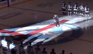 Video: Singer falls on his snot while singing the Canadian national anthem at ice hockey match