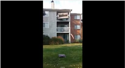 Video: This could be the greatest way of moving a couch from the balcony of a three storey house ever