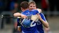Pic: Podge Collins consoles Clare team-mate Donal Tuohy after Cratloe beat Crusheen