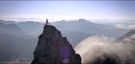 Video: Scottish stunt cyclist releases some incredible footage of him on top of a beautiful but deadly mountain range