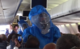 Video: Man on plane jokes about having Ebola, gets escorted from the plane by a hazmat crew