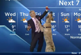 Video: Weather man does report while holding a massive dog, the result is fantastic