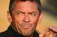 Pic: Phil Brown is actually wearing football boots while on radio co-commentary duty for the BBC tonight