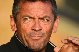 Pic: Phil Brown is actually wearing football boots while on radio co-commentary duty for the BBC tonight