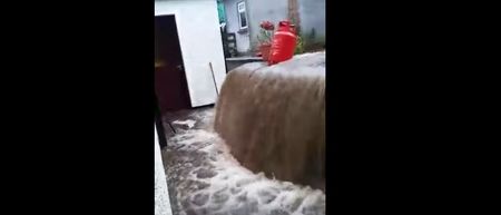 Video: Scary footage of a flash flood crashing into a house in Newry yesterday