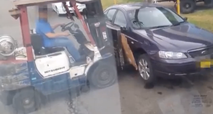 Video: Forklift operator helps out deliverymen by moving parked car across the street