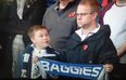 Video: Young lad gets over excited during minute’s silence, his dad’s response is great