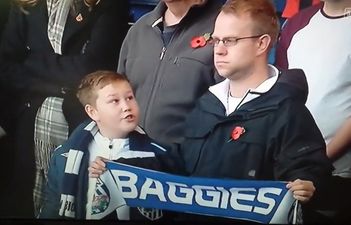 Video: Young lad gets over excited during minute’s silence, his dad’s response is great
