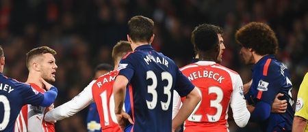 Should Jack Wilshere have been sent off for this head charge on Marouane Fellaini?