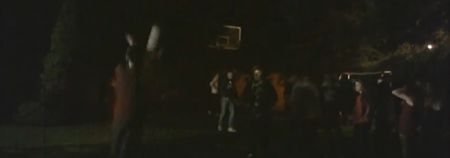 Video: Dublin teenager challenged to score a basket from a huge distance in front of a big crowd at a party. He nails it.