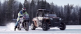 Video: A motorbike and ATV drift around a frozen lake in this incredible display of driving
