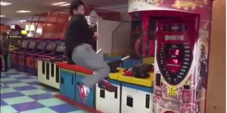 Video: This guy absolutely destroys a punching bag arcade game with a class flying ninja kick