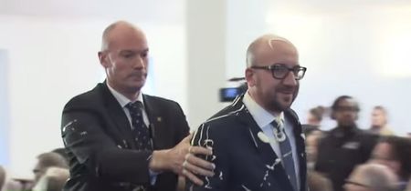 Video: Belgian Prime Minister was pelted with chips and mayonnaise by protestors