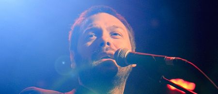 Which Premier League striker was filmed crowd surfing at a Kasabian gig?