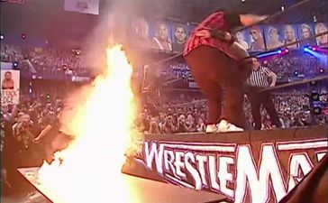 Video: Here’s some of the best WWE moments with wrestlers smashing through tables