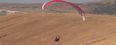 Video: Nothing to see here… Just a man paragliding on a Harley-Davidson