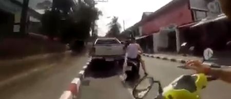 Video: Irish lad in Thailand rents moped, crashes it straight into a shop, gets zero sympathy from his friends