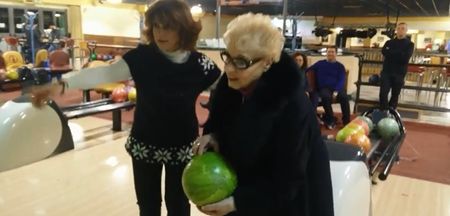 Video: 84-year old woman tries bowling for the first time; hits a strike on her first throw