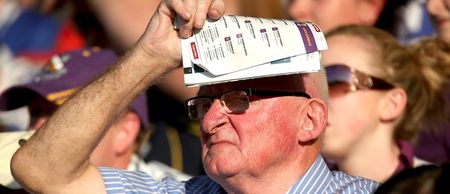 Pic: GAA fan in Newry combines woolly hat and match programme to create ingenious sun visor
