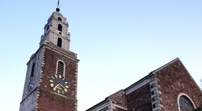 Pic: Two idiots taking selfies on the ledge of a balcony 120 feet off the ground in Cork