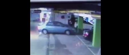 Video: This girl repeatedly drove over her laptop without realising it