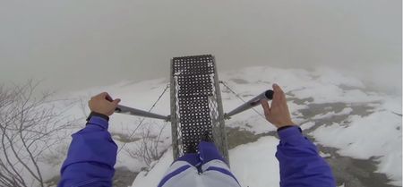 Video: Daredevil captures the moment he base jumps off a mountain into a foggy abyss