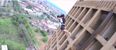 Video: Base jumpers film a race to the top of a tower block and back down again