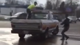 Video: Brave stuntman stops out of control truck in car park