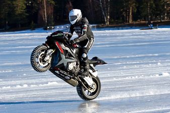 Video: 23-year-old biker sets World Record by landing a 206km/h wheelie on ice