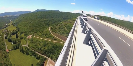 Video: Ballsy BASE jumper leaps off bridge from moving van