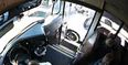 Video: Speeding motorist passing a bus comes perilously close to running over three kids