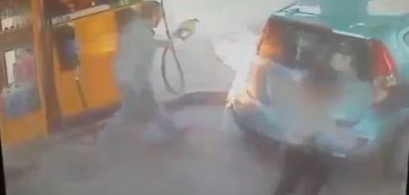 Video: Woman sets fire to a petrol pump while a man is using it in this incredible footage