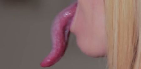 Video: This 18-year old girl has a tongue so long she can touch her own eyeball with it