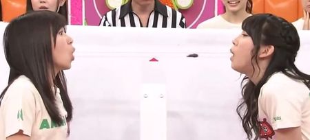 Video: Two girls try to blow a cockroach into the other’s mouth on bizarre Japanese game show